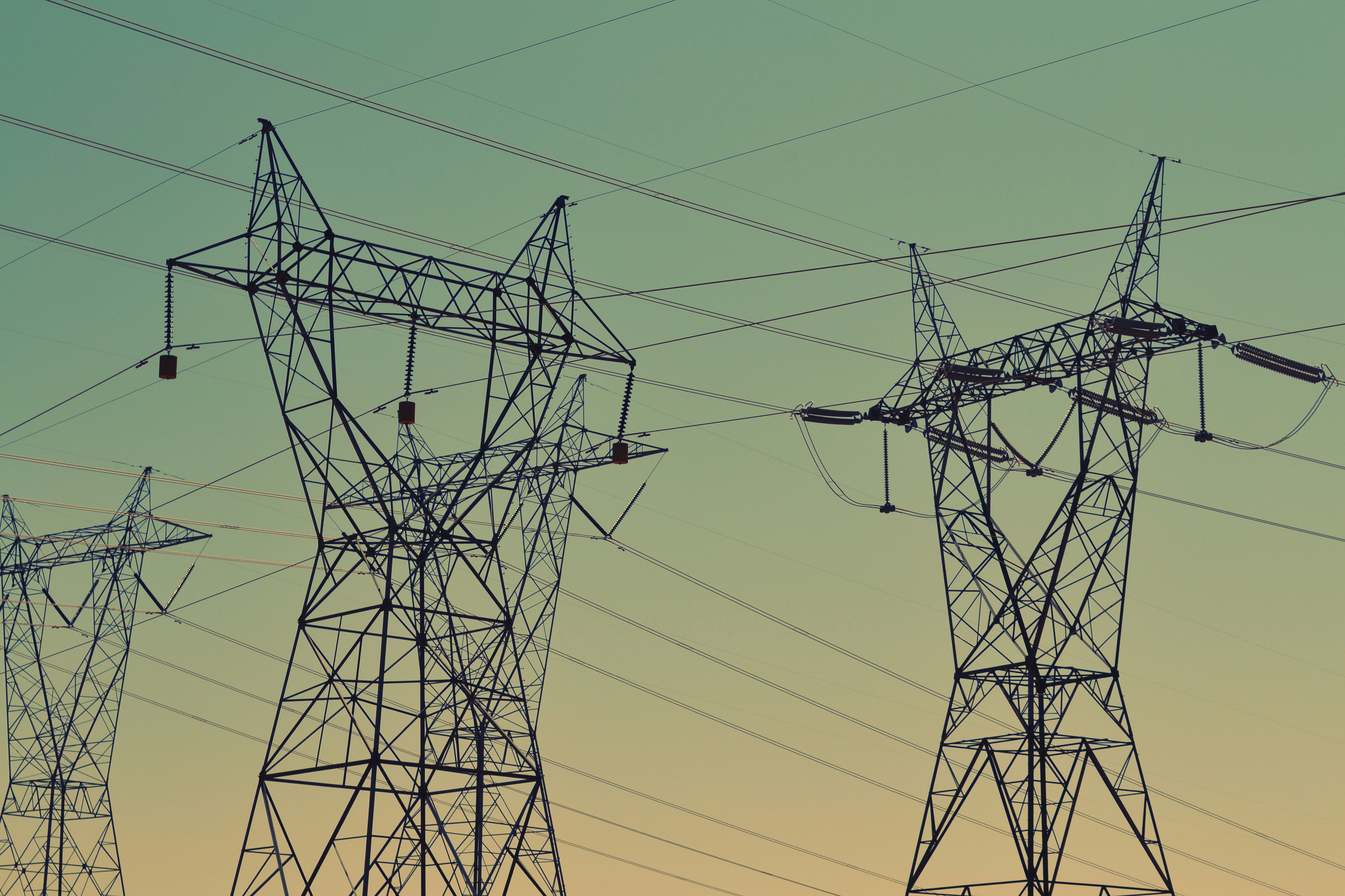A wide transmission line network extending across the landscape.
